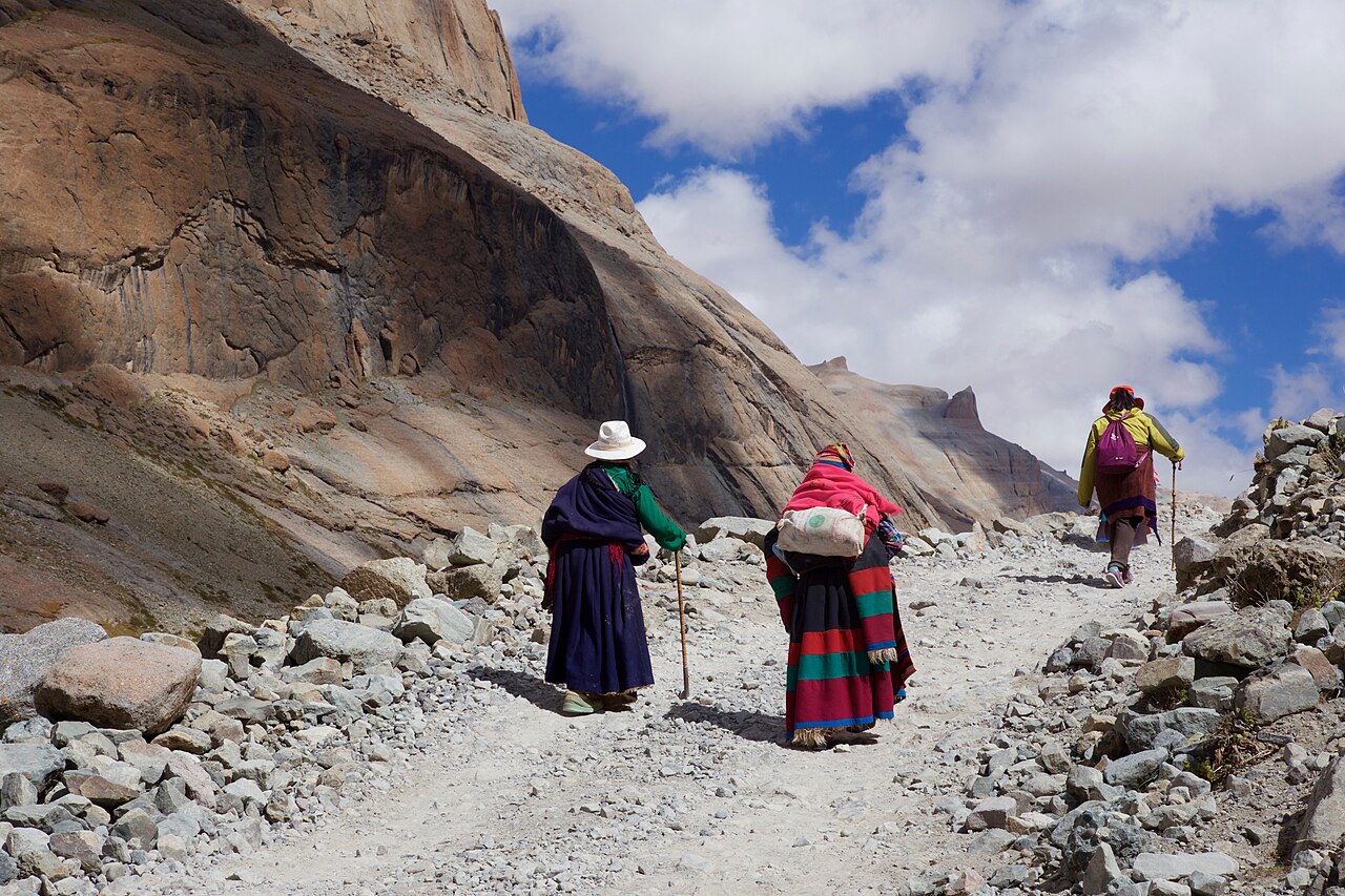 Tibetan pilgrims walking the high kora path around Mount Kailash