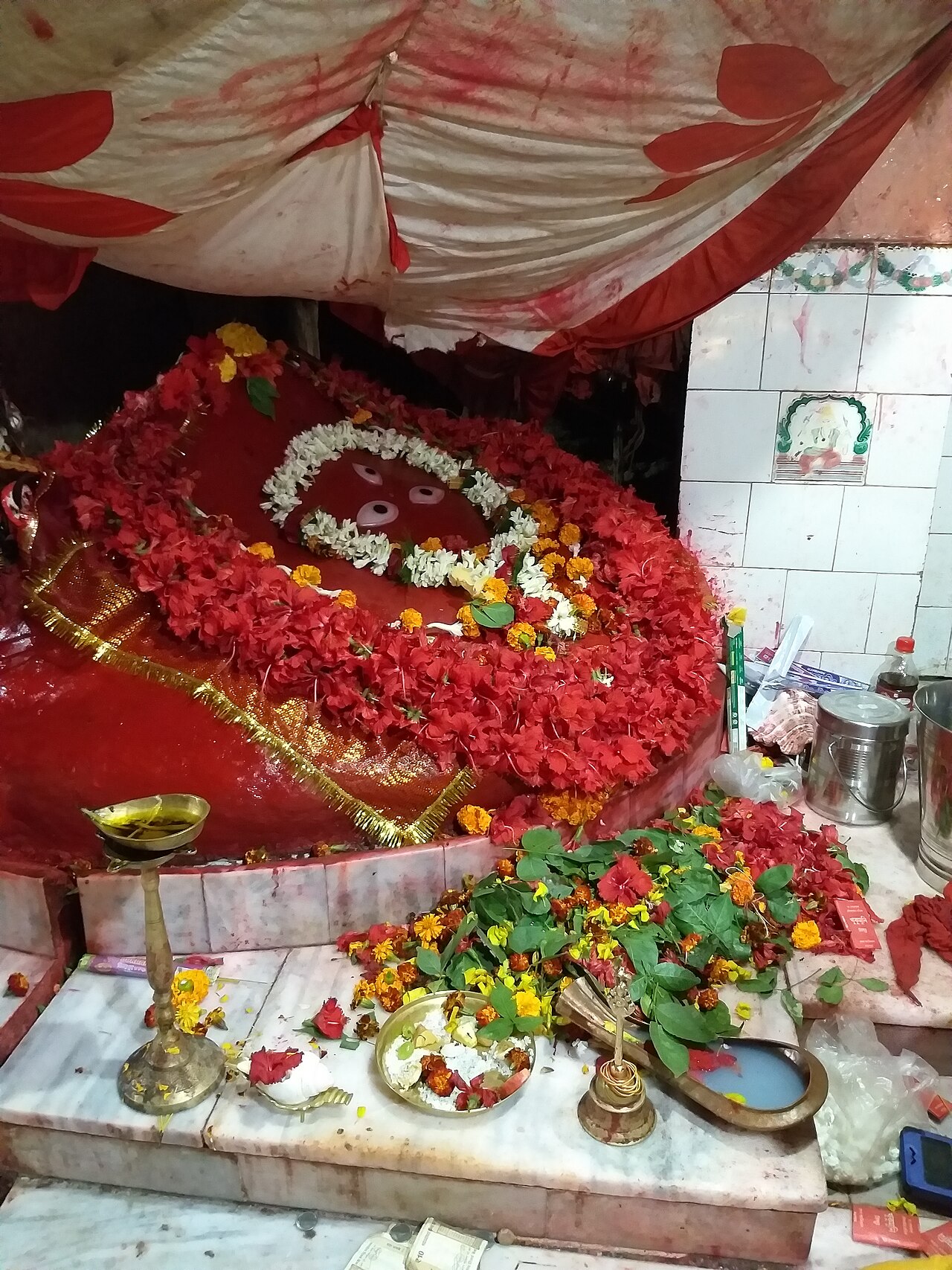 The sindur-adorned Idol Of Maa Nandikeshwari in Her sanctum