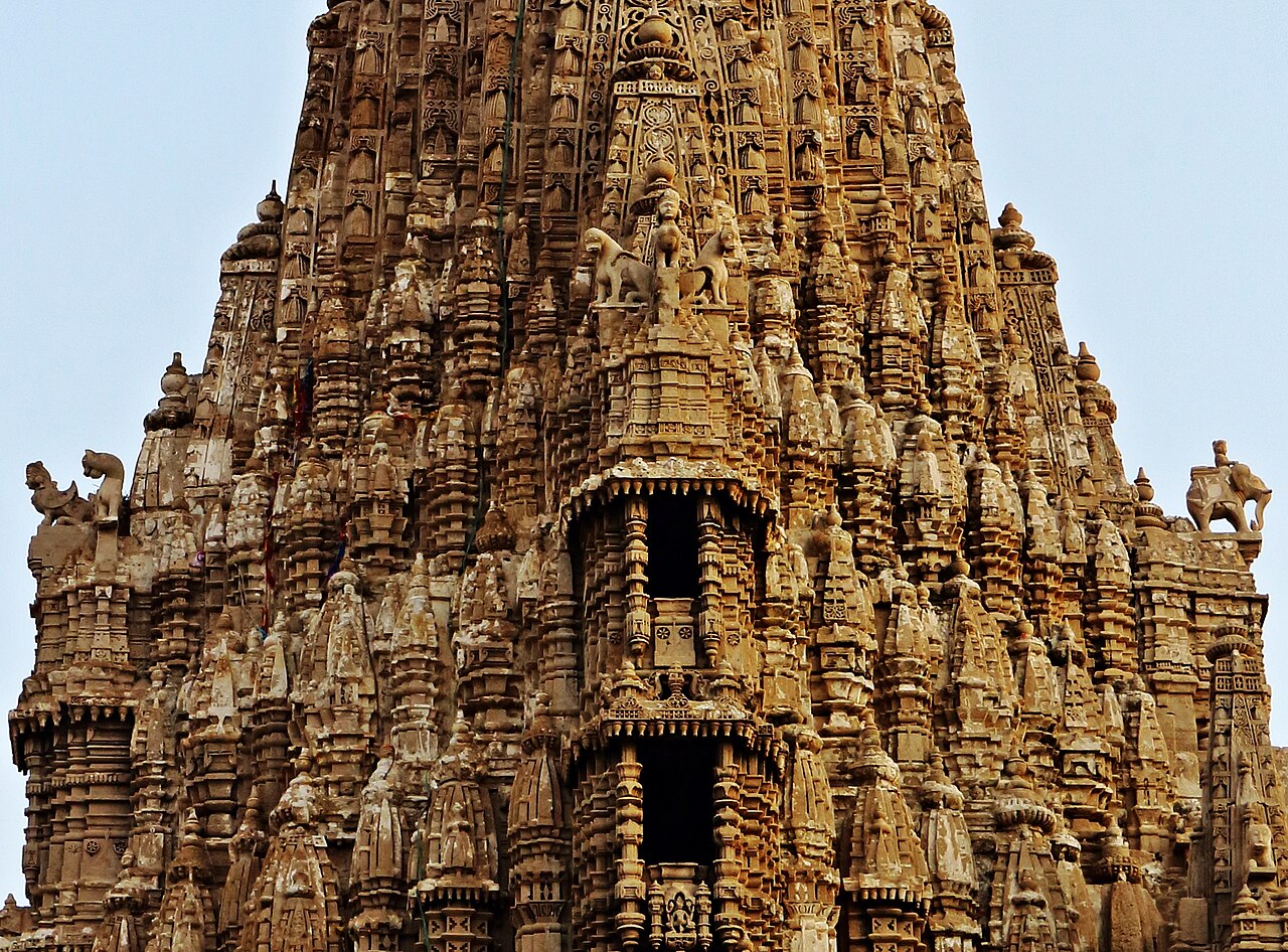 Tier upon tier of carved figures on the shikhara of the Dwarkadhish temple
