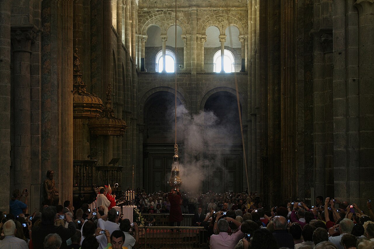 The Botafumeiro in mid flight above the crossing of Santiago Cathedral