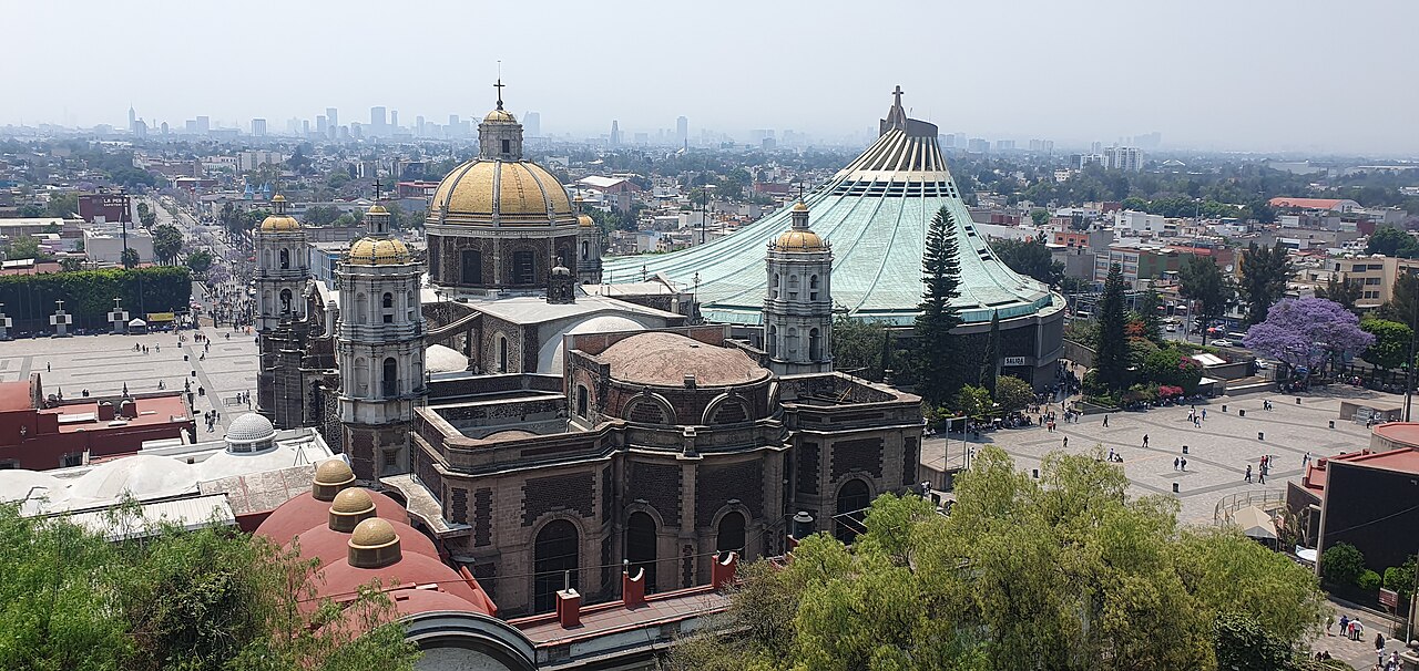 The old and new basilicas of Guadalupe and the plaza seen from the top of Tepeyac hill