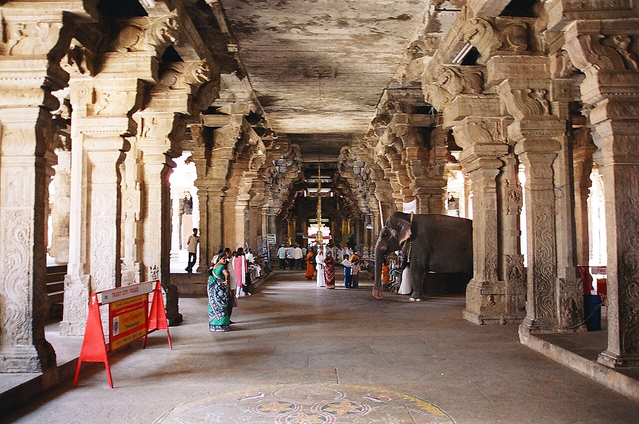 The Temple elephant standing among carved corridors inside Sri Ranganathaswamy Temple