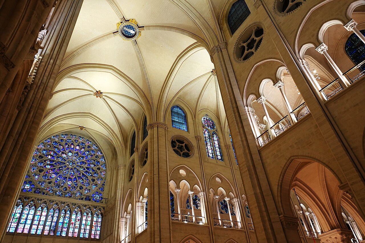 The restored interior of Notre-Dame de Paris under the south rose window, December 2024