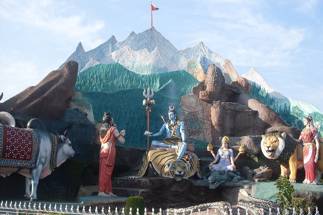 The gold-topped mandir Of Maa Tripuramalini rising above the Devi Talab, Jalandhar