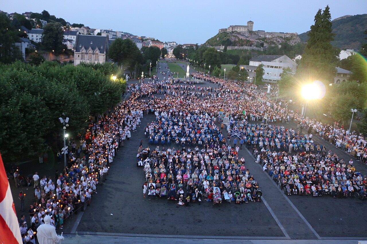 The torchlight Marian procession filling Rosary Square at night