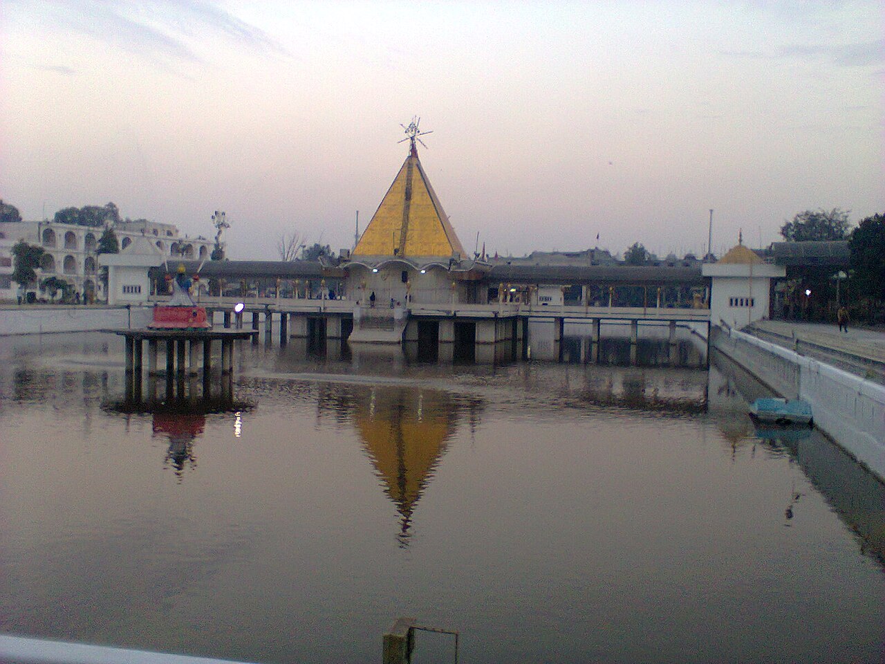The sacred waters of the ancient talab beside Her mandir