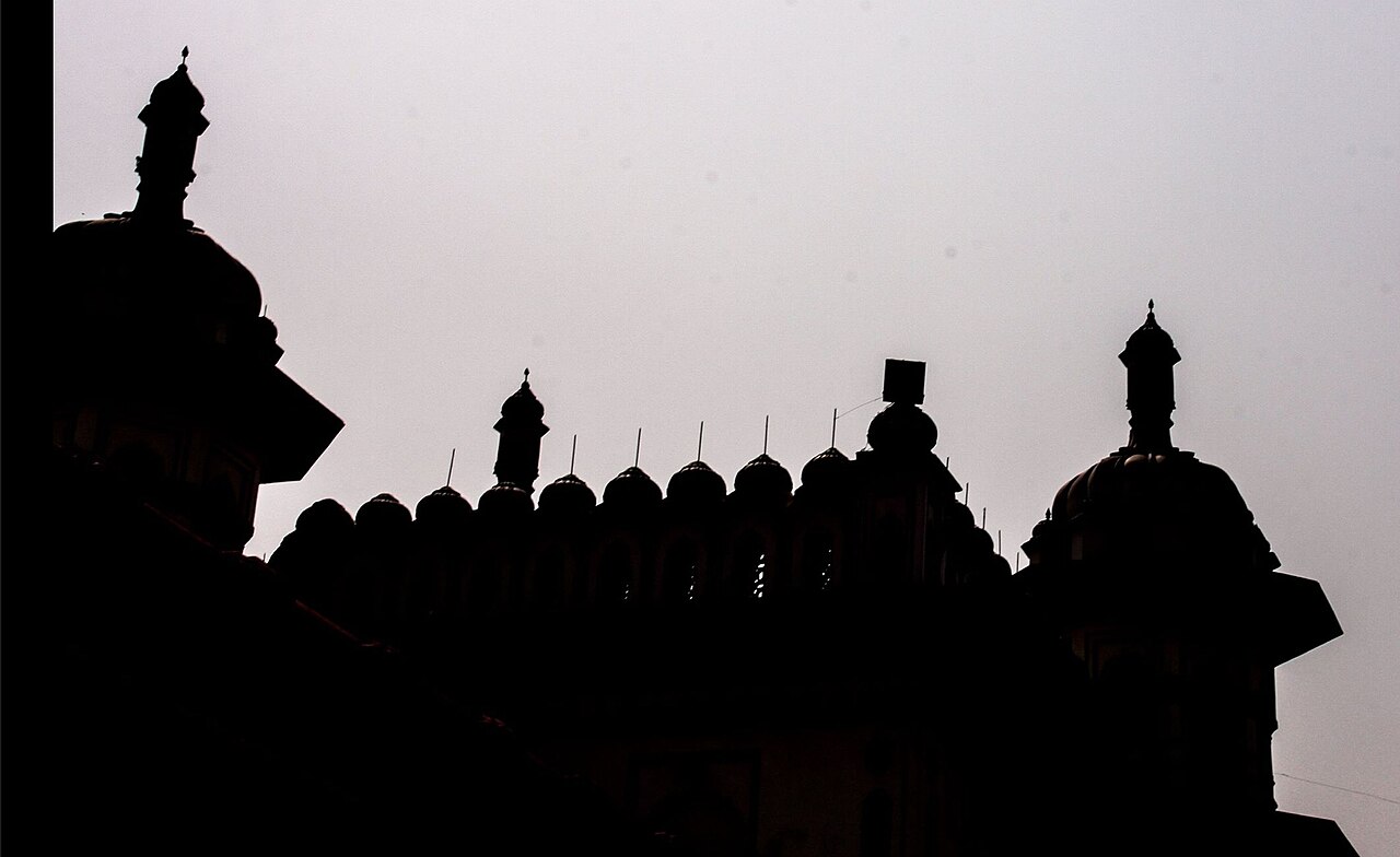 Janaki Mandir glowing under lights in the evening