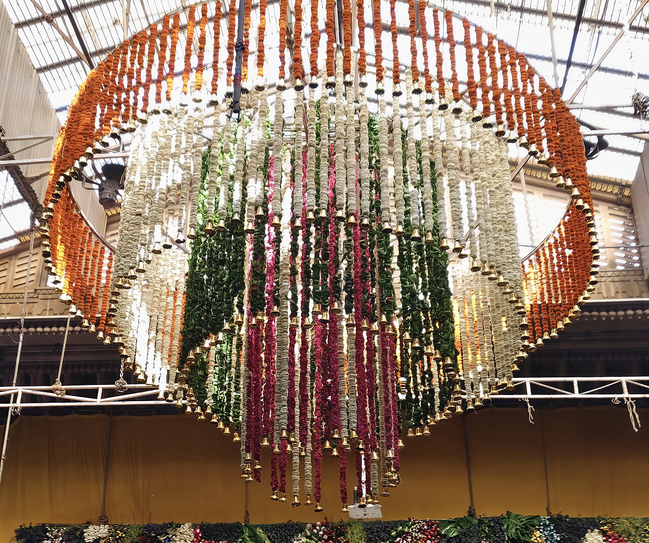 A floral chandelier of marigold, jasmine and rose strung with brass bells during Phool Bangla at Shri Banke Bihari Mandir