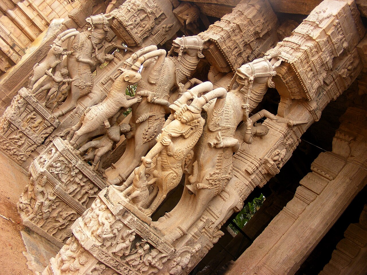 Rearing stone horses and riders carved from single granite pillars at the thousand-pillared hall, Srirangam