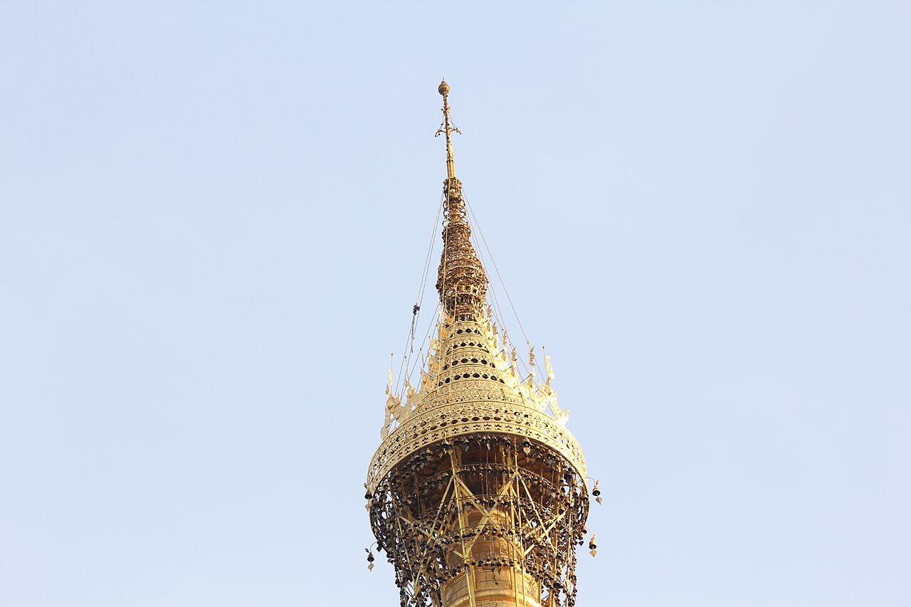The upper spire of the Shwedagon zedi, where the banana bud rises to the jewelled hti umbrella