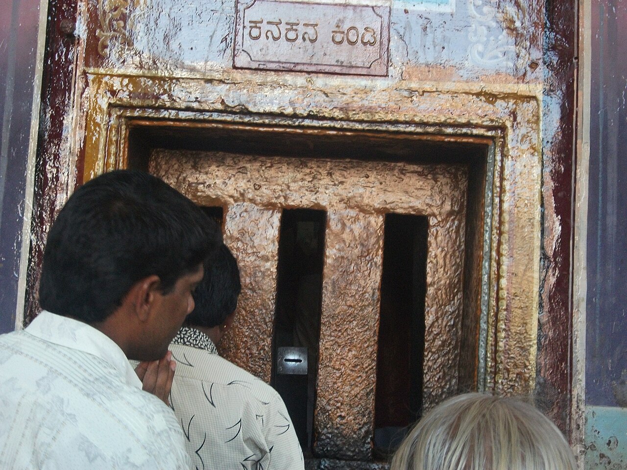 The silver-plated Kanakana Kindi window through which pilgrims receive darshan of Lord Krishna at Udupi