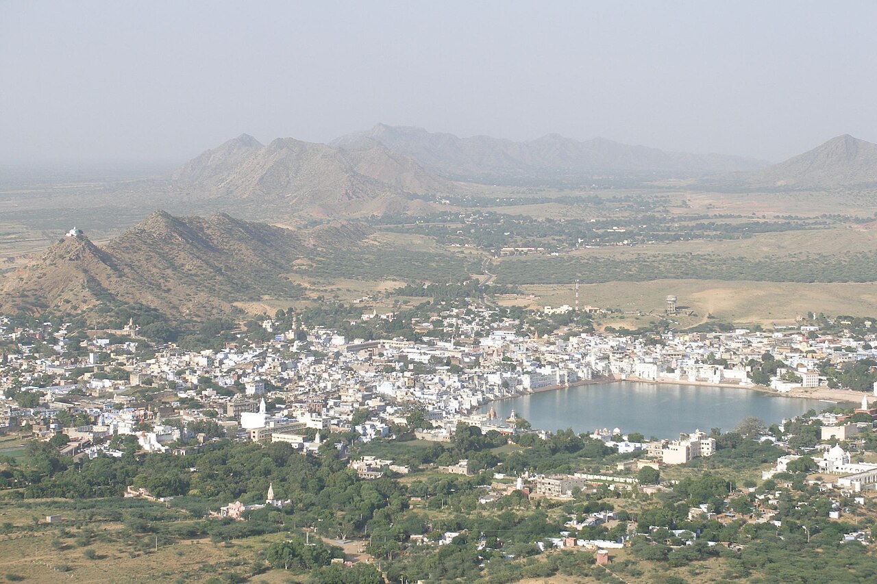 Pushkar town and the open Rajasthan country around it, seen from a hilltop