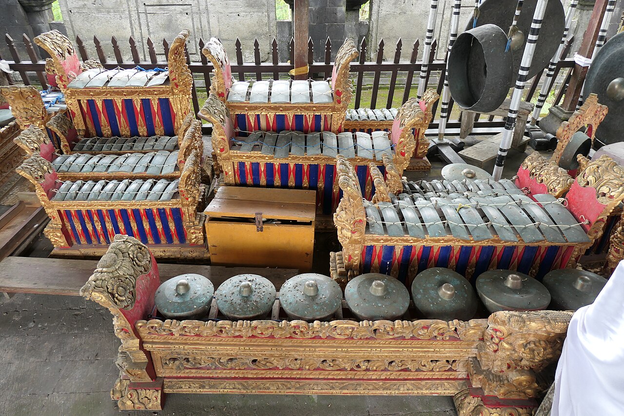 The temple gamelan of Pura Besakih, its gilded frames and gongs waiting under a pavilion