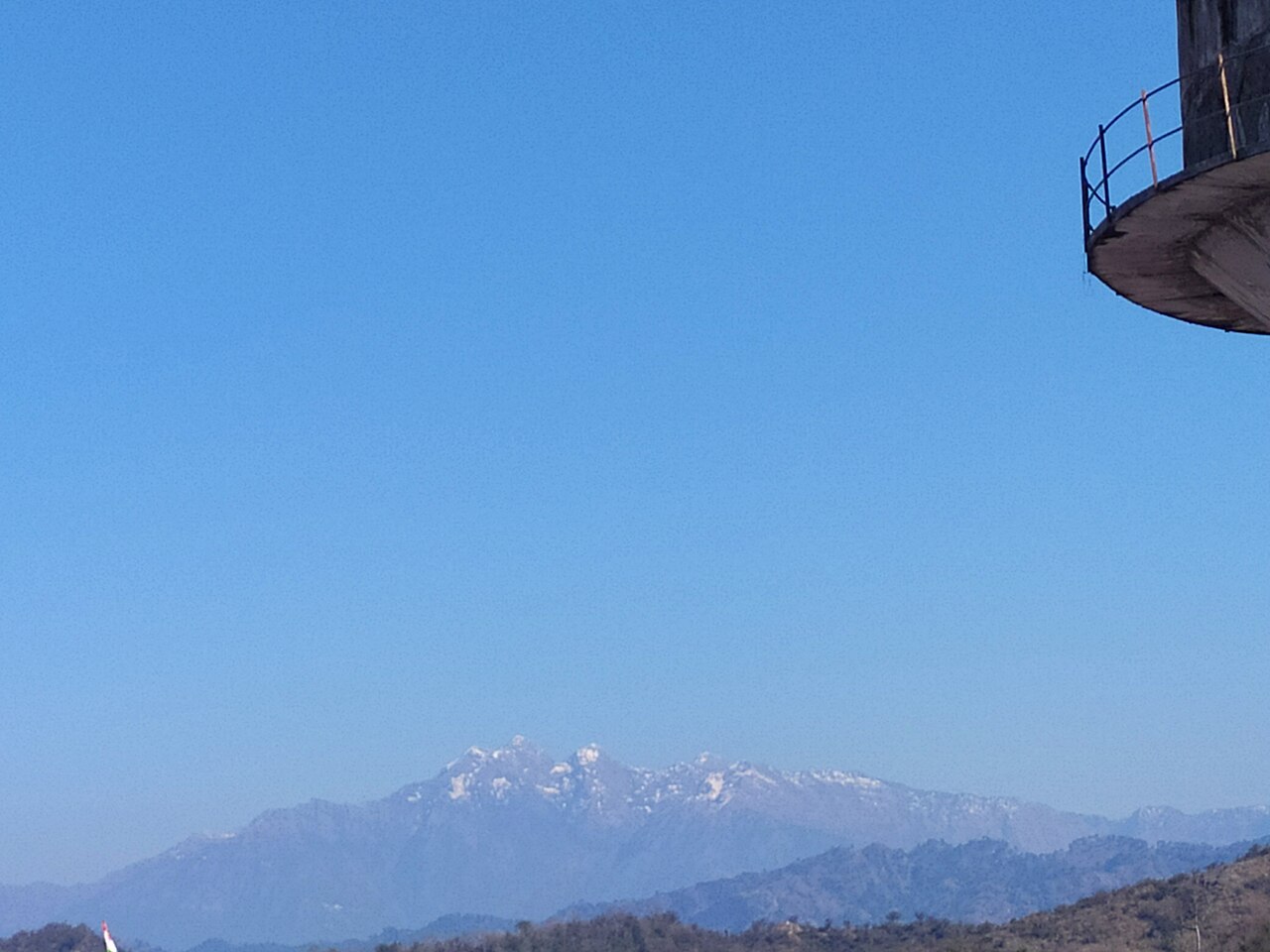 Snow upon the Trikuta hills, the abode Of Maa Vaishno Devi