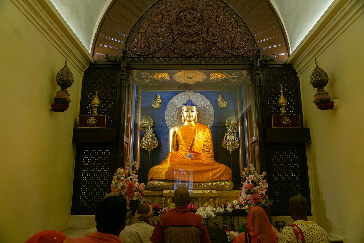 The gilded Buddha in the sanctum of the Mahabodhi Temple, seated in the earth-touching gesture